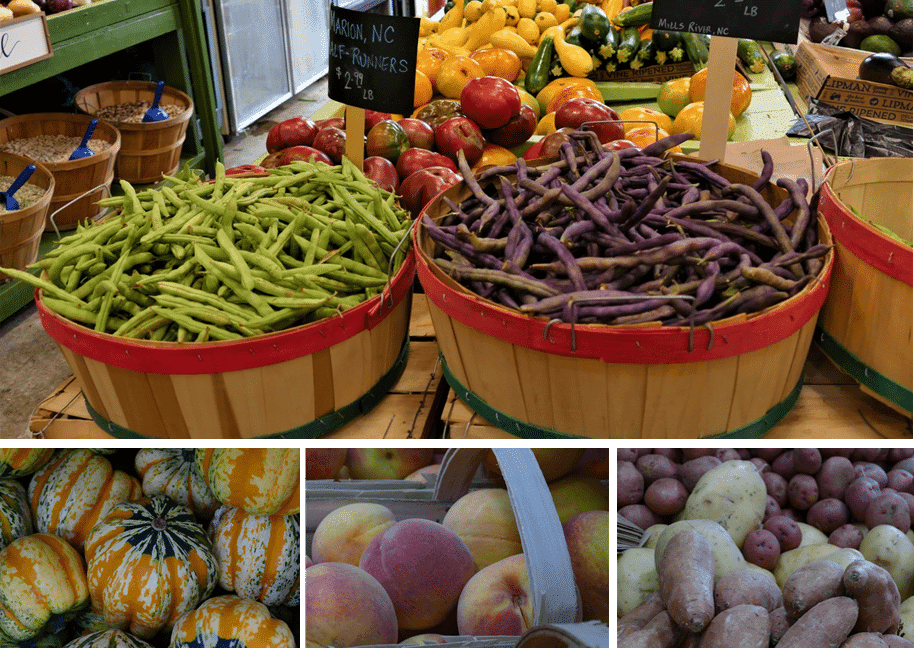 A vibrant display of fresh vegetables and fruits in wooden baskets at a market.