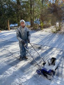 George pushing the snowblower along the Andon-Reid Inn driveway.