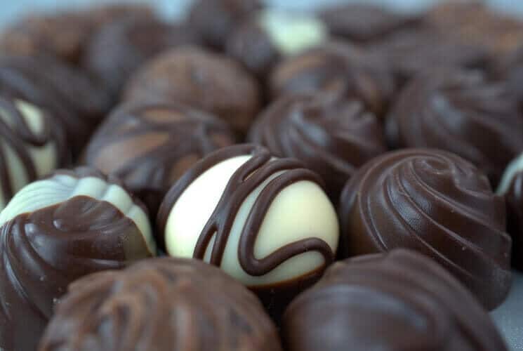 Cluster of delicious white and milk chocolate truffles